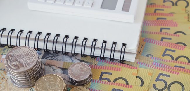 Australian money, AUD with calculator, notebook Australian Superannuation Changes 2021